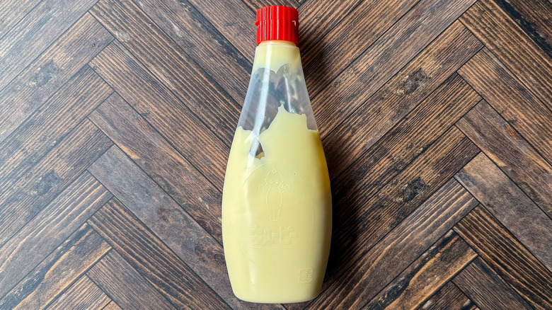 Bottle of Japanese Kewpie mayo on tabletop