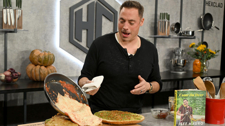 Jeff Mauro cooks onstage