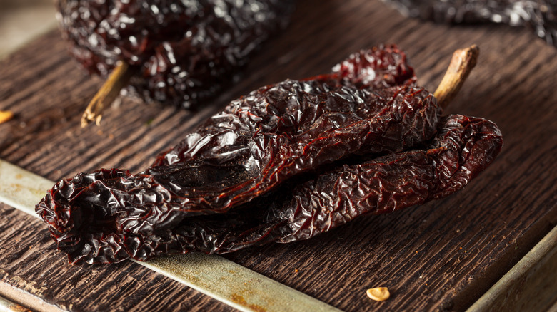 Ancho chiles on cutting board