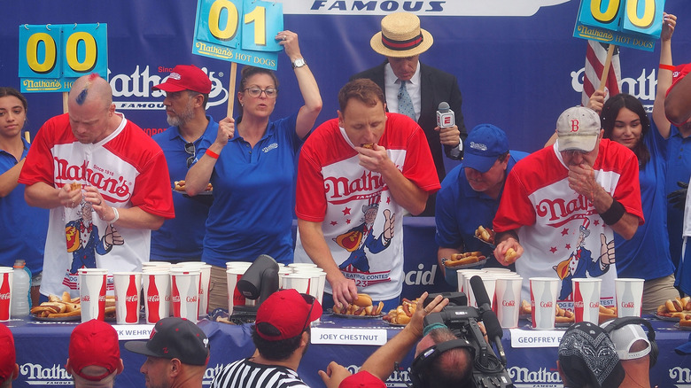 Joey Chestnut eating hot dogs