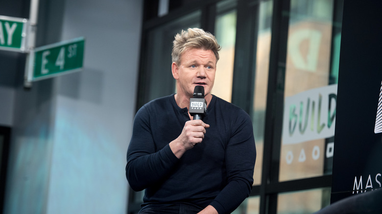 Gordon Ramsay talking on microphone