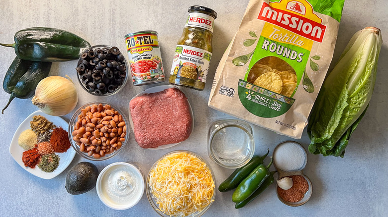 Loaded beef taco casserole ingredients on countertop