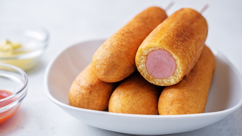 Corn dogs on plate