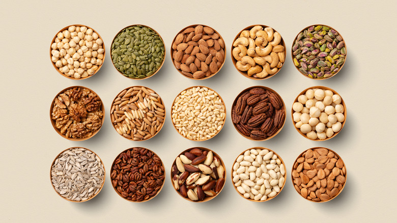 Overhead view of bowls of nuts in three rows