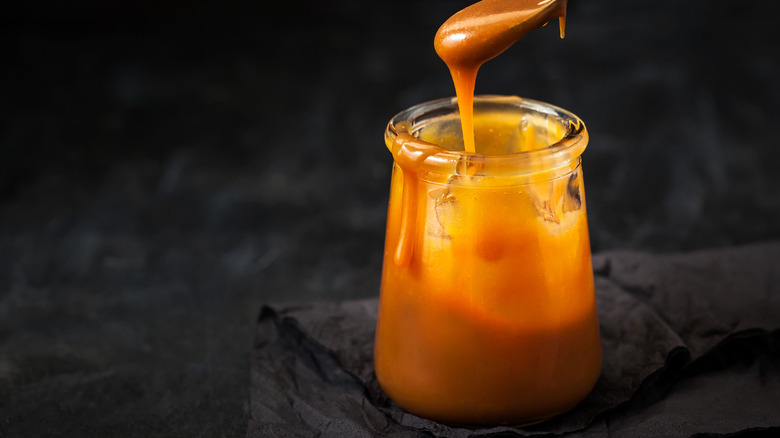 A jar of caramel sauce