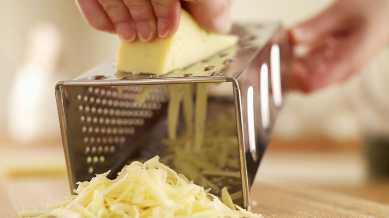 Grating cheese with a box grater