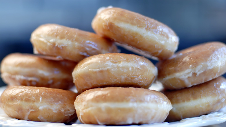 A plate of glazed donuts