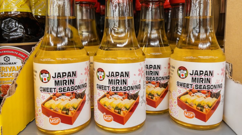 Bottles of mirin on a shelf