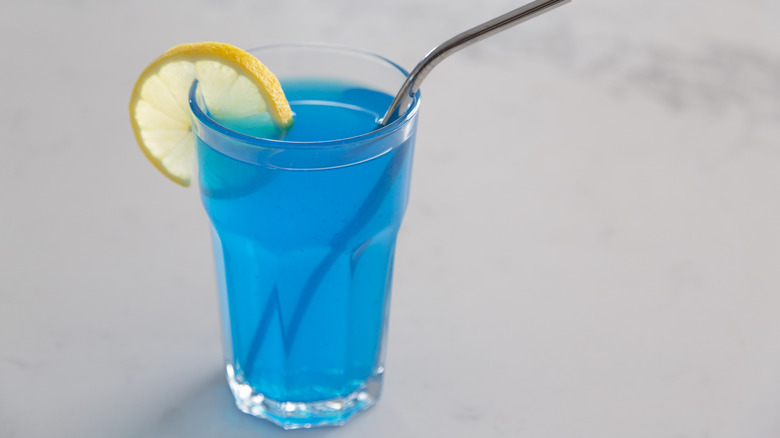 glass of a blue soda