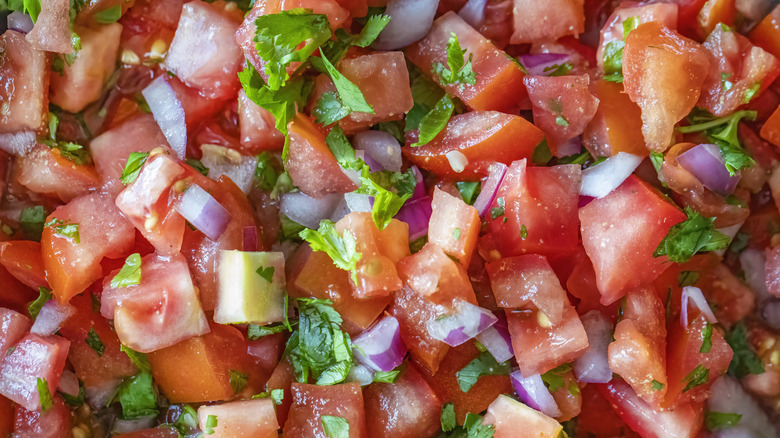 Bowl of salsa with ingredients