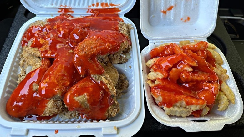 mumbo sauce on wings, rice, and fries