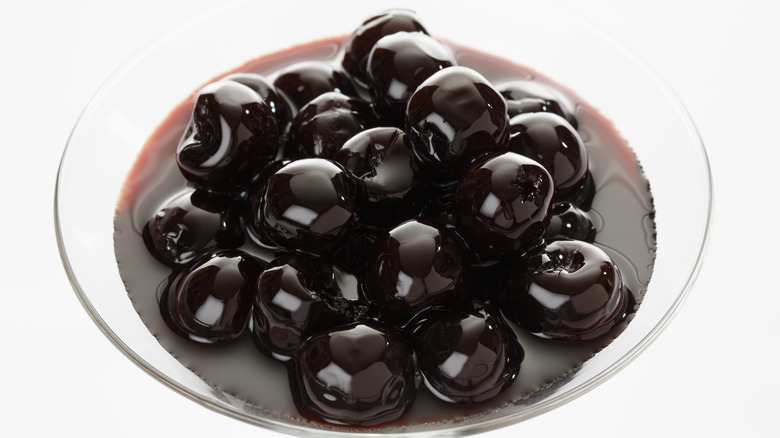 A glass bowl of Amarena cherries in syrup