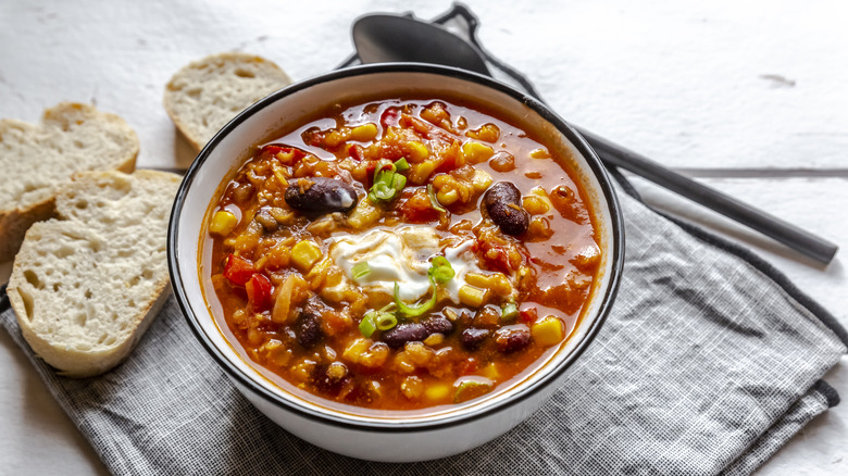 Bowl of chili with bread