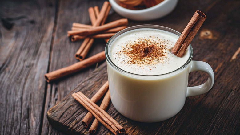 Eggnog with a cinnamon stick