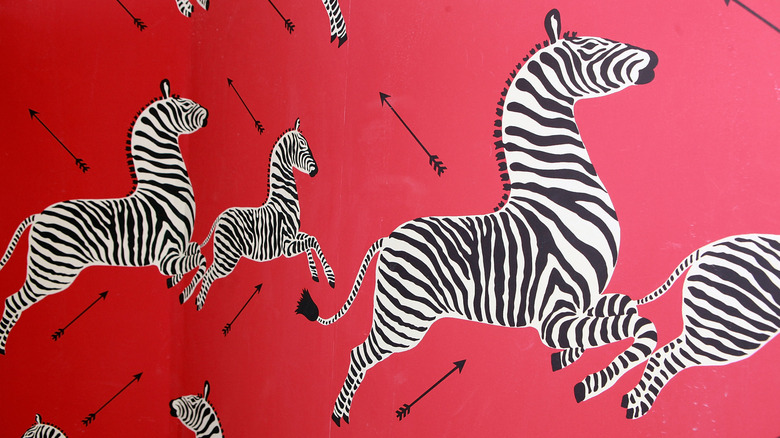 A reproduction of the famous "Scalamandre wallpaper" from Gino of Capri (or Gino's) featuring zebras and arrows over a bright crimson background at 780 Lexington Avenue in Manhattan that closed in 2010.