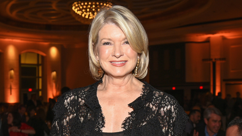 Martha Stewart in a black dress at a fancy event