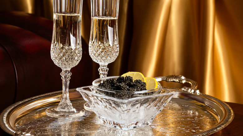 Tray of champagne and caviar