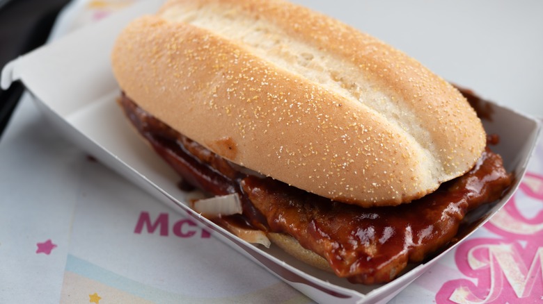 McDonald's McRib sandwich in a paper tray