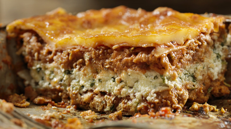 Lasagna with layers of bolognese and ricotta