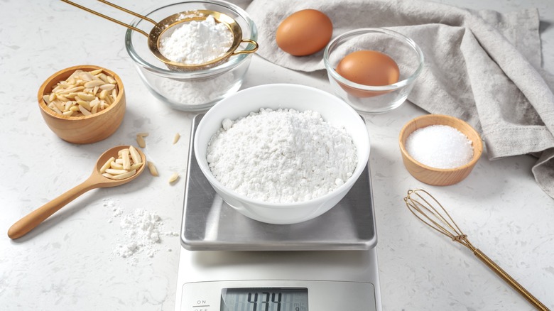 Bowl of flour on scale and other ingredients