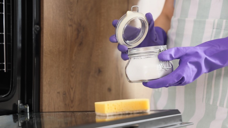 Woman cleaning with baking soda