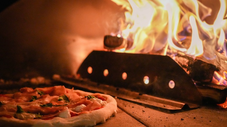 pizza in a wood fired oven