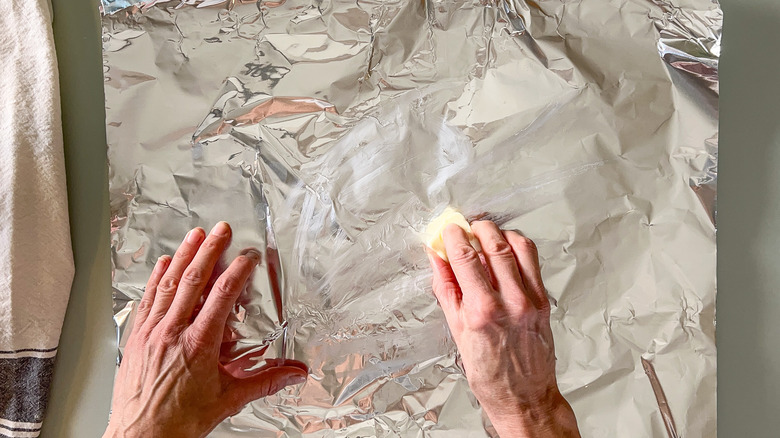 Buttering a sheet of foil
