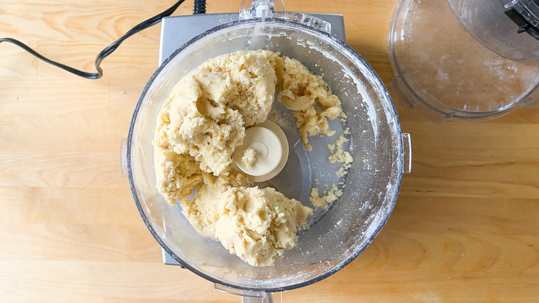 Quiche dough in food processor bowl