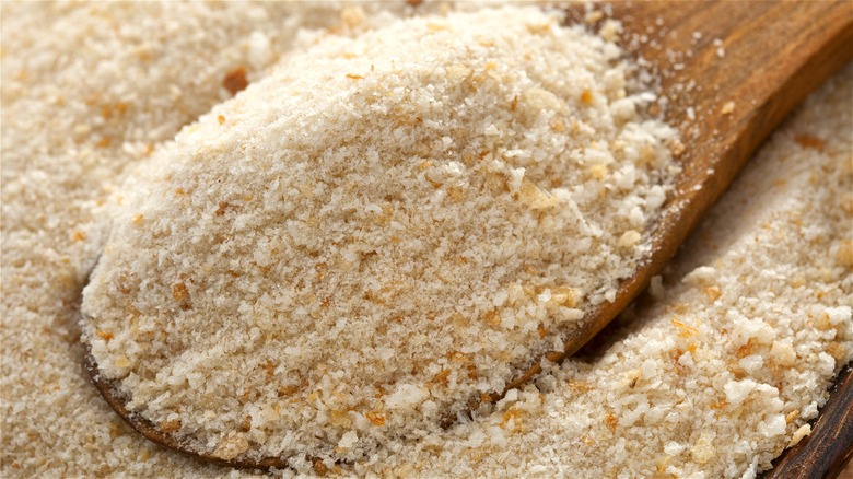 breadcrumbs on wooden spoon