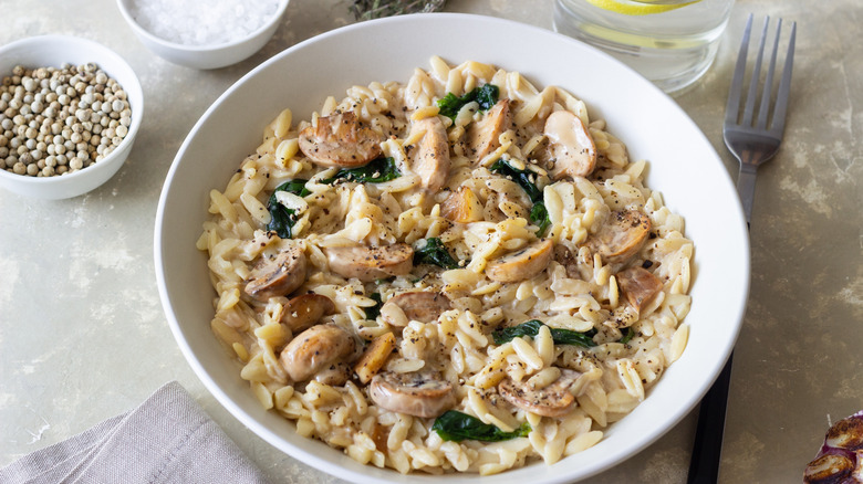 risotto made with orzo with mushrooms and spinach