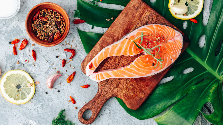 fish steak pictured on cutting board