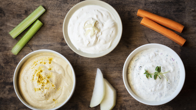 An aerial view of three different dipping sauces