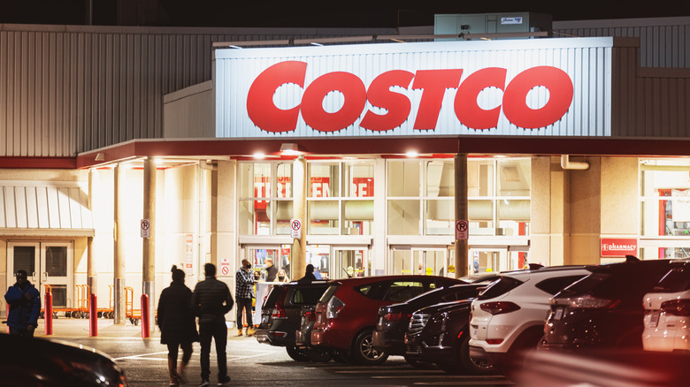 A Costco warehouse's entrance late at night