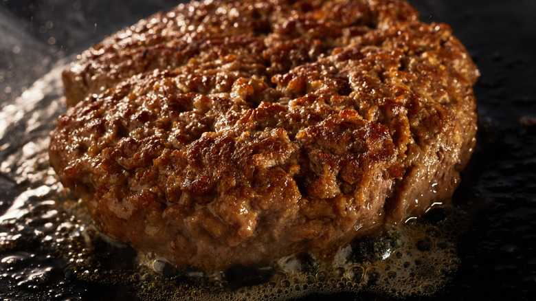 Burger patty on a griddle