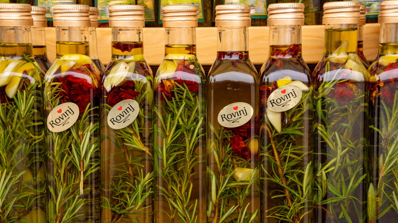 Bottles of Croatian Olive Oil with herbs