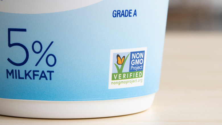 Close-up of non-GMO project verified logo on yogurt container