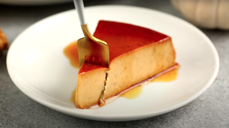 Eating slice of pumpkin flan