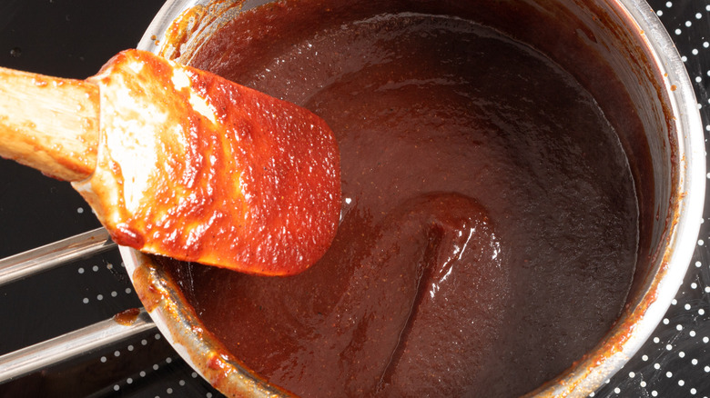 Cooking bbq sauce in a saucepan