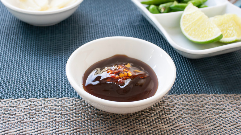 A bowl of hoisin sauce.