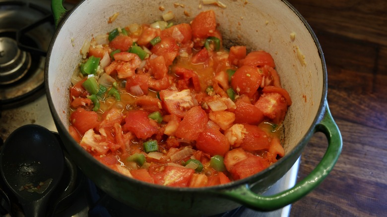 pot of tomatoes and diced vegetables