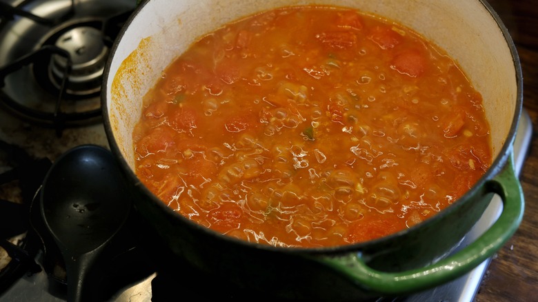 pot of simmering tomato bisque