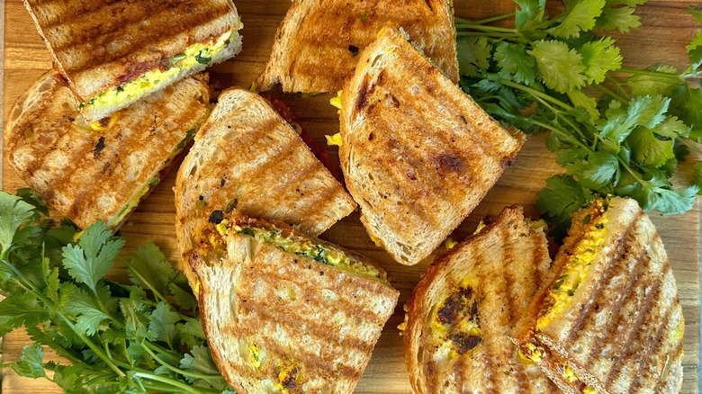 panini on cutting board with cilantro