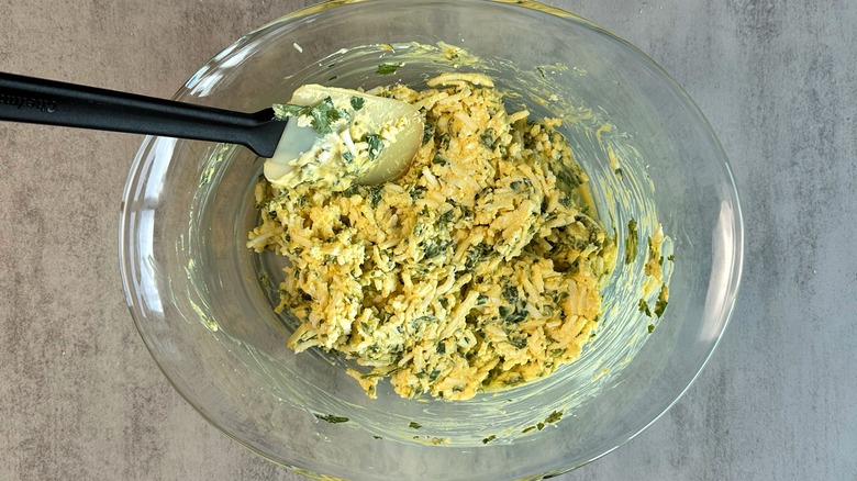 shredded paneer and yogurt mixture in bowl