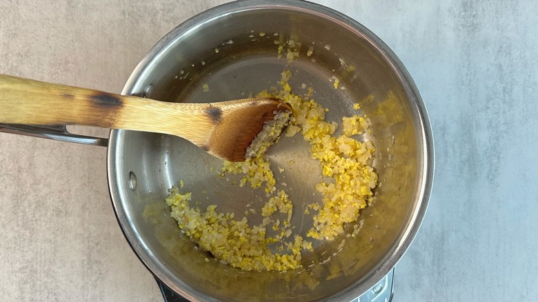 onion, garlic, and ginger in saucepan