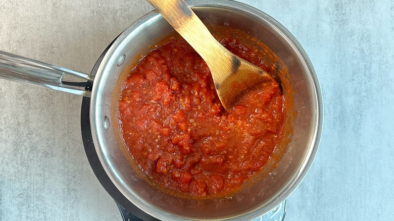 saucepan with crushed tomatoes