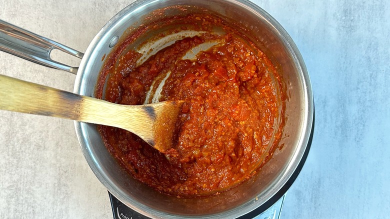 reduced tomato sauce in saucepan