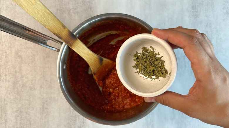 dried fenugreek over tomato jam