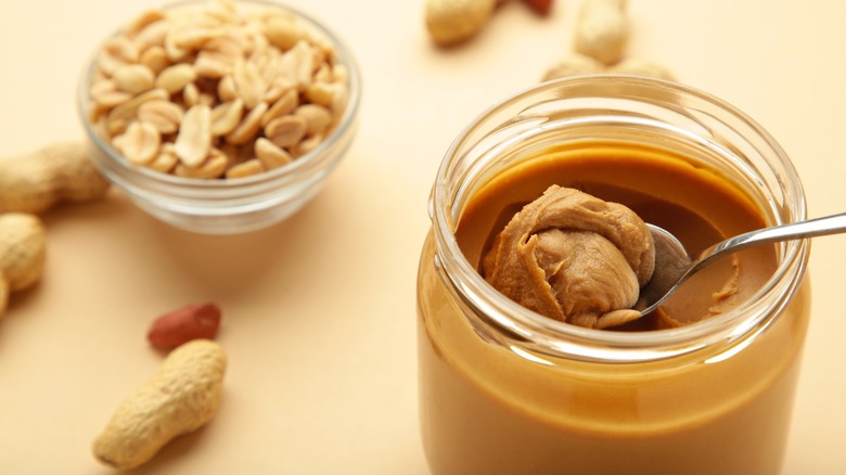 Jar of peanut butter with spoon