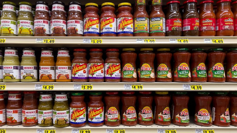 Store-bought salsa on supermarket shelf