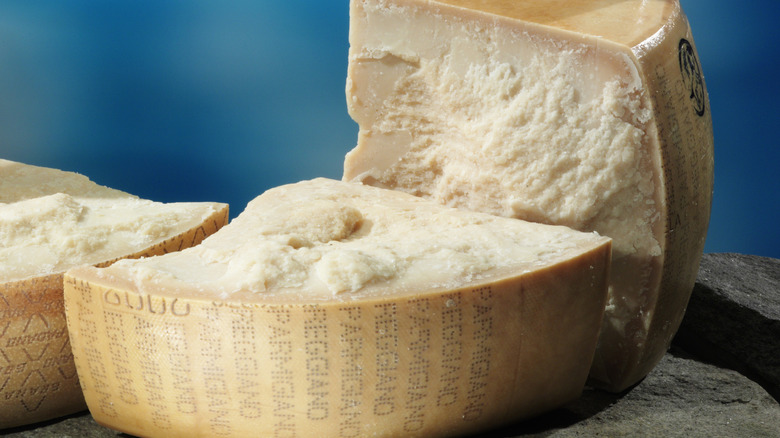 Sliced wheel of parmigiano reggiano.